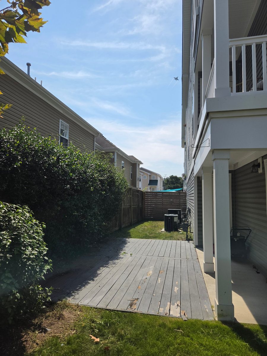Same deck area after hedge trimming and clearing